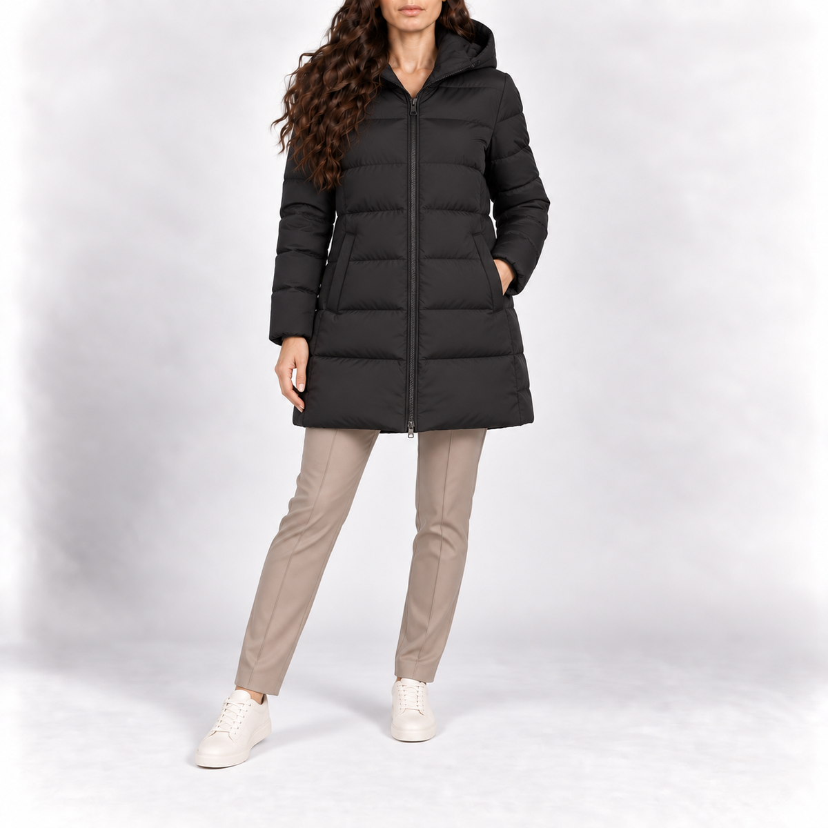 Model wearing the hooded puffer coat in black